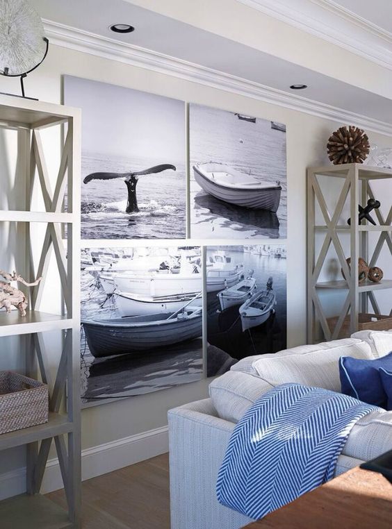 salotto-ispirazione-casa-al-mare-tavolino-quadri-barche